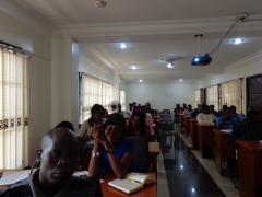 A SECTION OF STUDENTS RECEIVING LECTURE